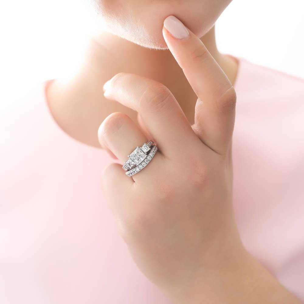 Model wearing 3-Stone Princess CZ Ring Set in Sterling Silver