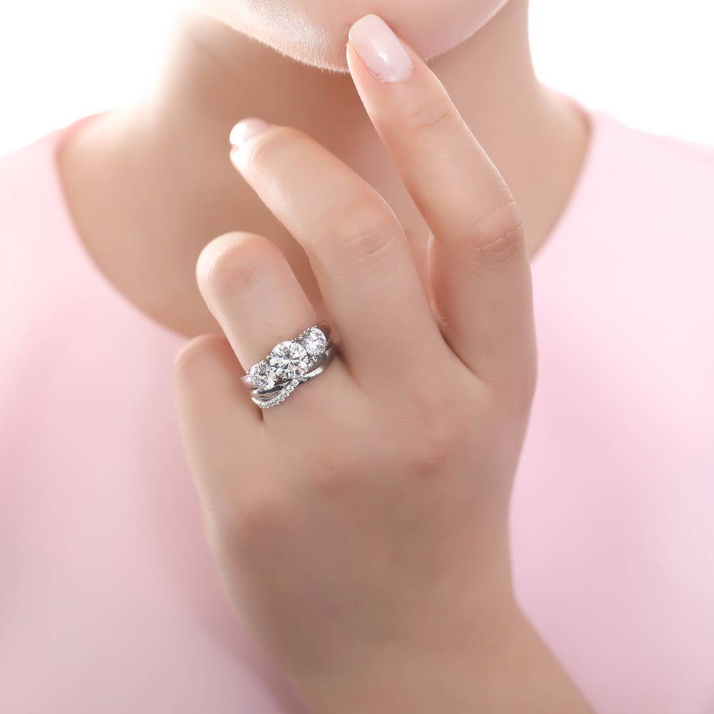 Model wearing 3-Stone Criss Cross Round CZ Ring Set in Sterling Silver