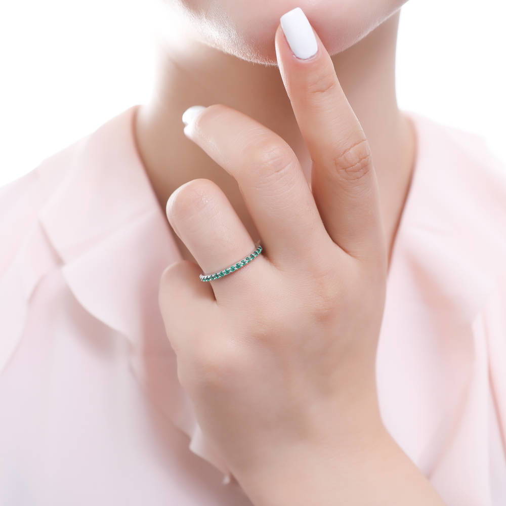 Model wearing Simulated Emerald Pave Set CZ Half Eternity Ring in Sterling Silver, 2 of 7