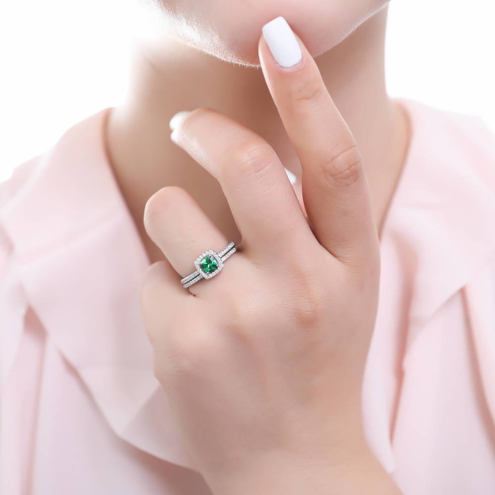 Model wearing Halo Simulated Emerald Cushion CZ Ring Set in Sterling Silver