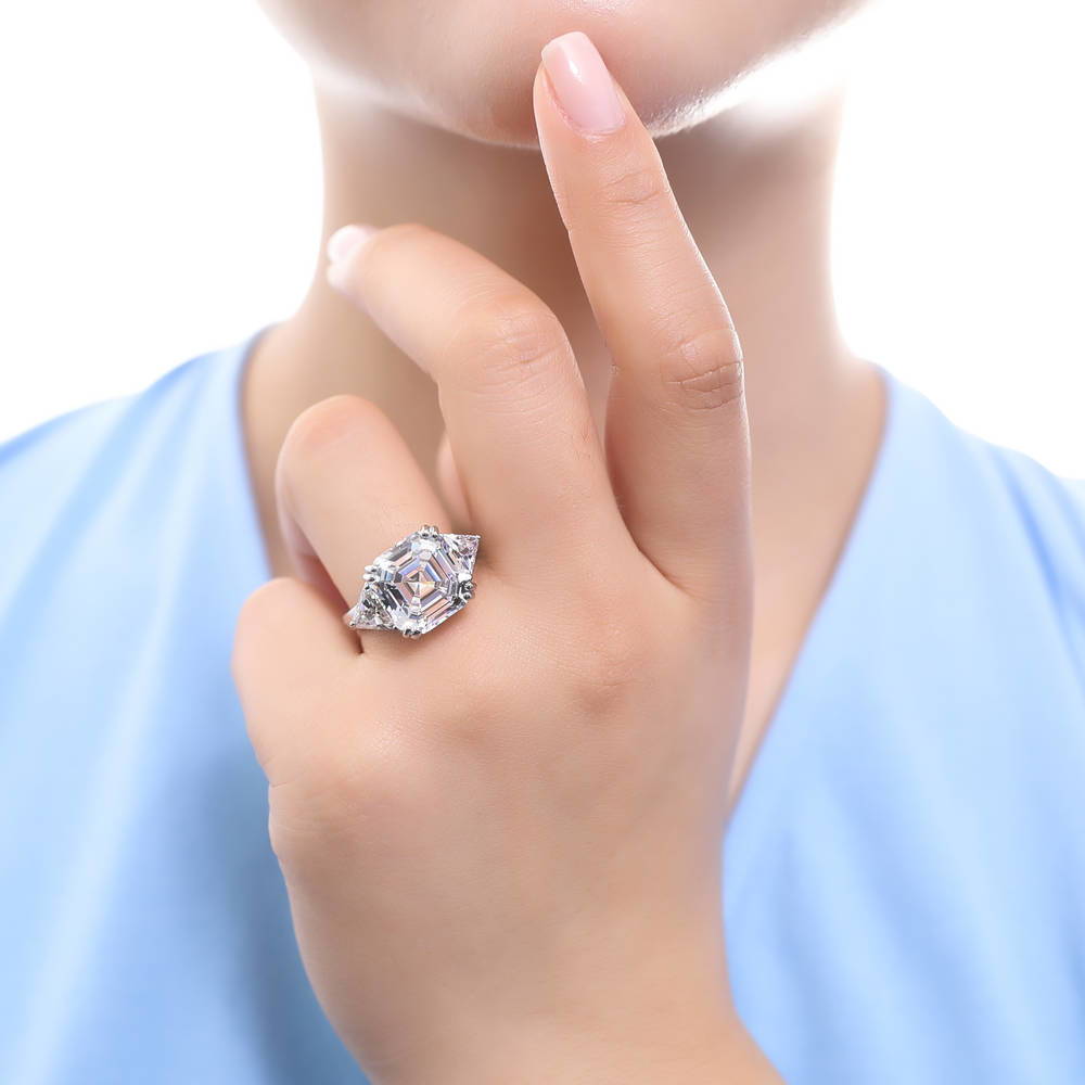 Model wearing 3-Stone Asscher CZ Statement Ring in Sterling Silver