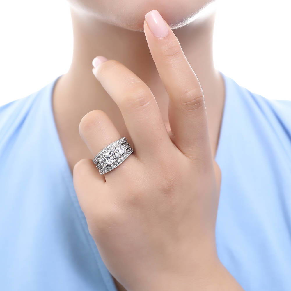 Model wearing 3-Stone Princess CZ Ring Set in Sterling Silver