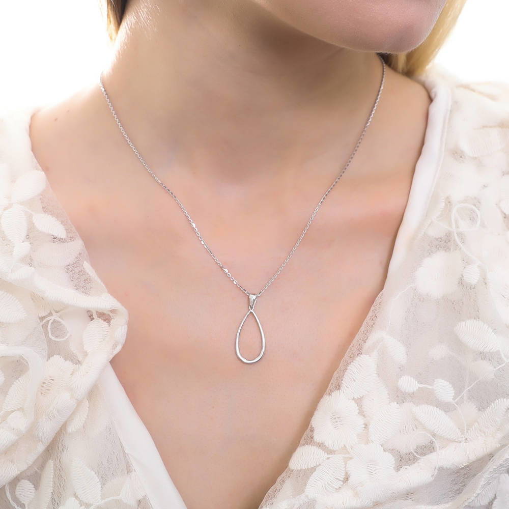 Model wearing Teardrop Pendant Necklace in Sterling Silver