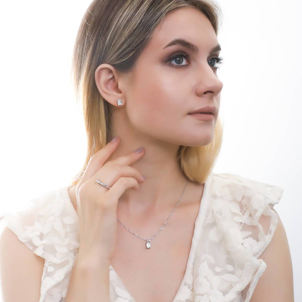 Model wearing Solitaire 1ct Emerald Cut CZ Pendant Necklace in Sterling Silver