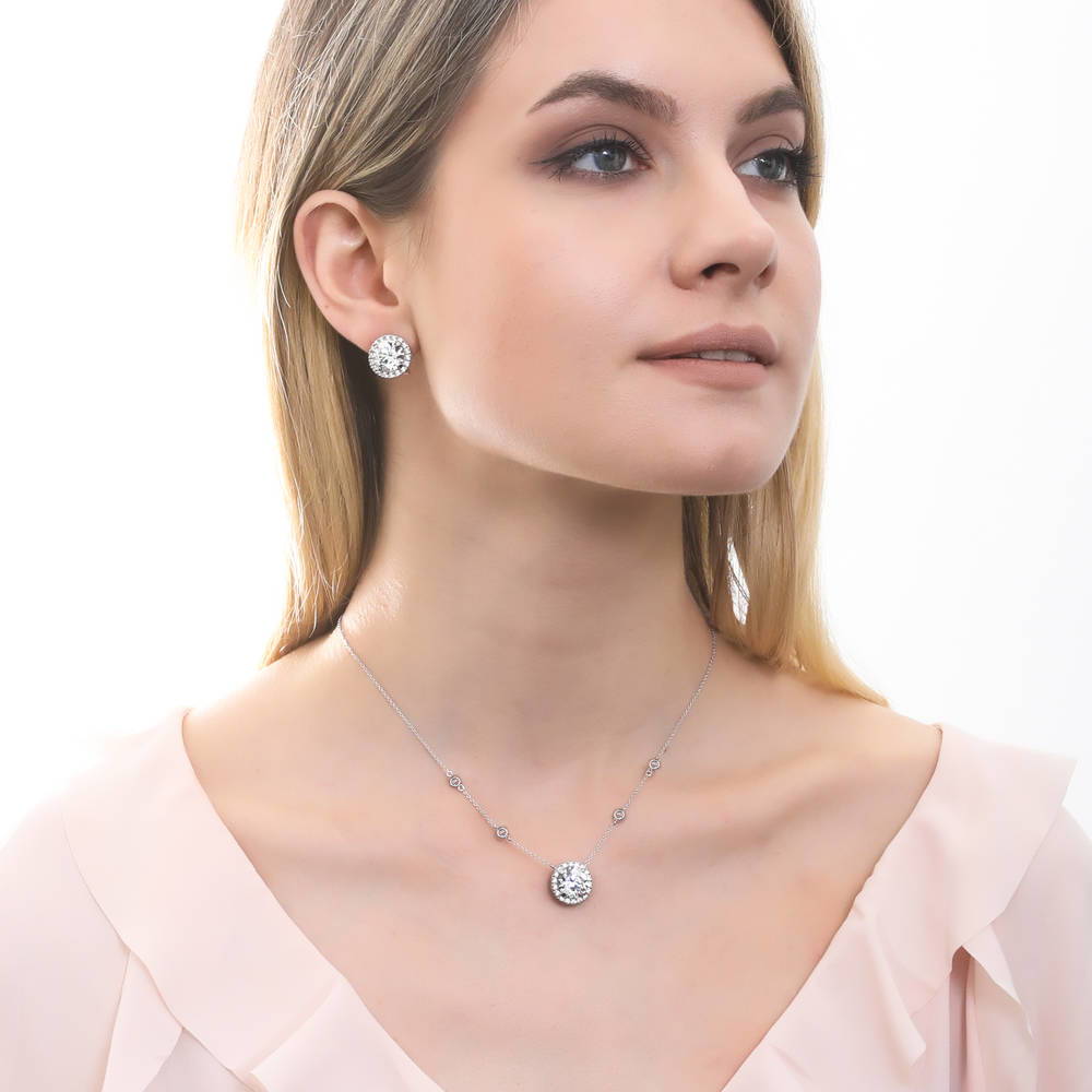 Model wearing Halo Round CZ Statement Pendant Necklace in Sterling Silver