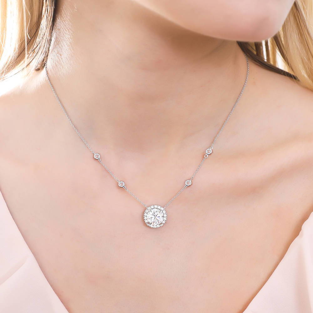 Model wearing Halo Round CZ Statement Pendant Necklace in Sterling Silver