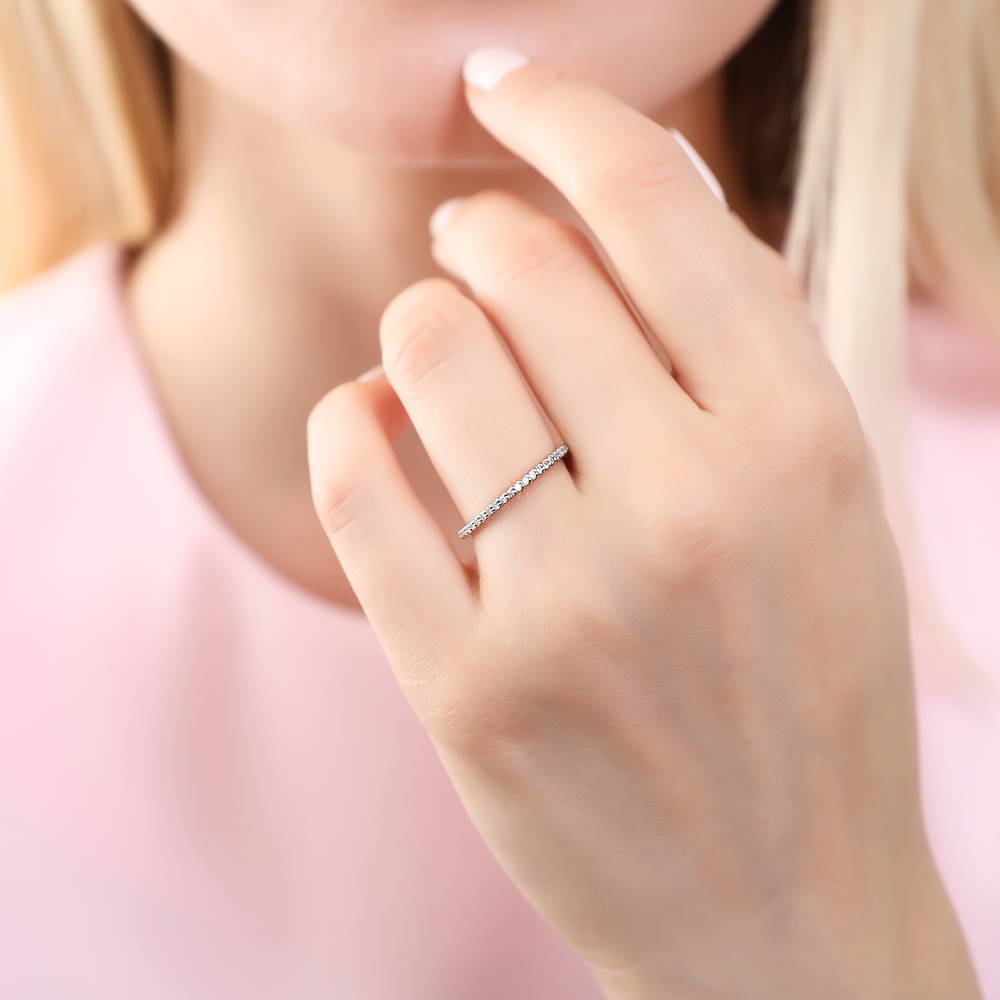 Model wearing Pave Set CZ Eternity Ring in Sterling Silver, 3 of 6