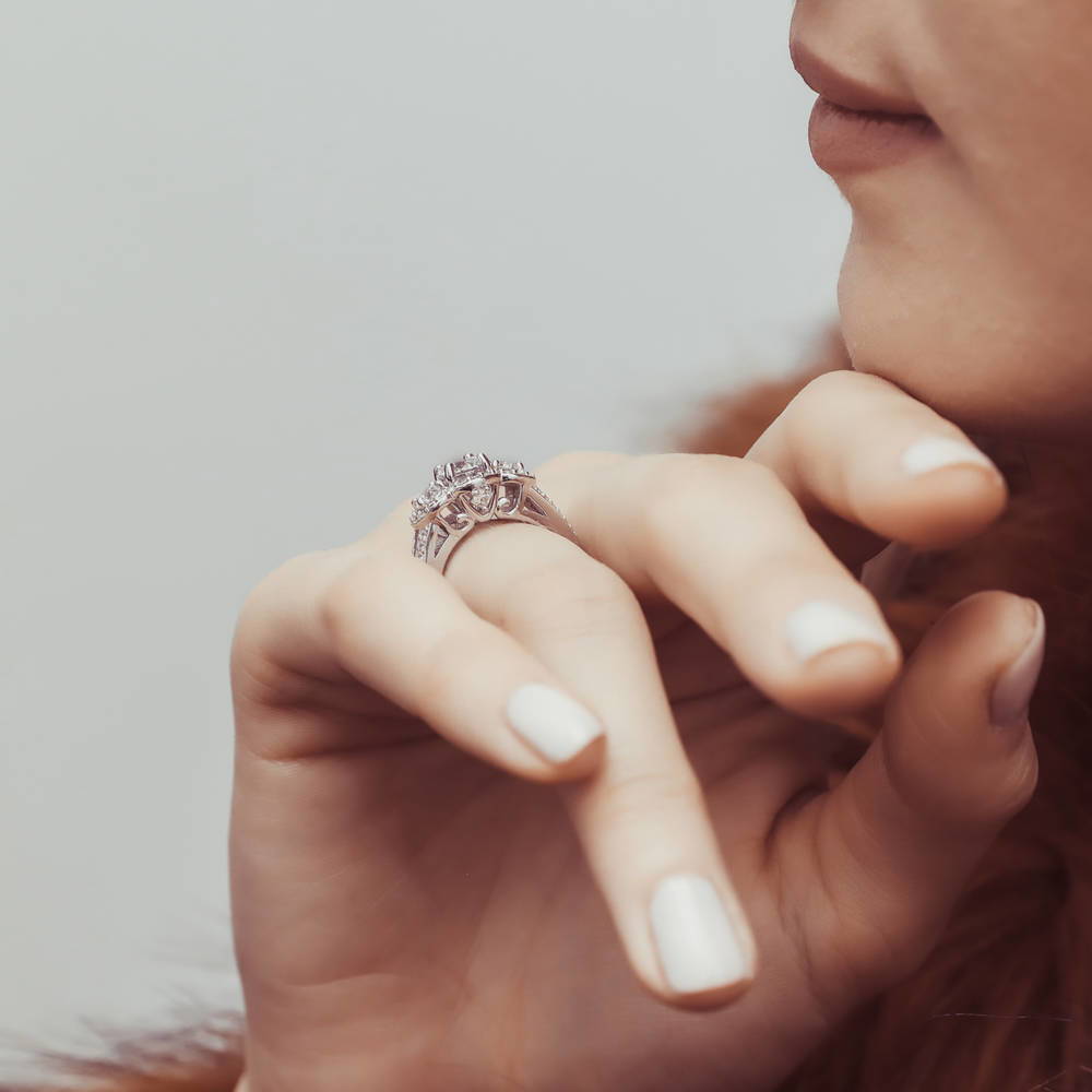 Model wearing 3-Stone Round CZ Split Shank Ring in Sterling Silver