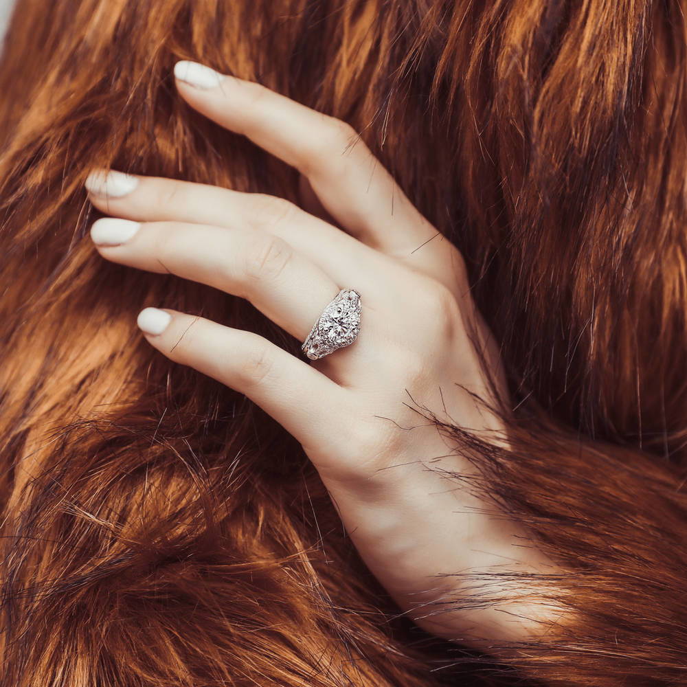 Model wearing Halo Art Deco Round CZ Ring in Sterling Silver