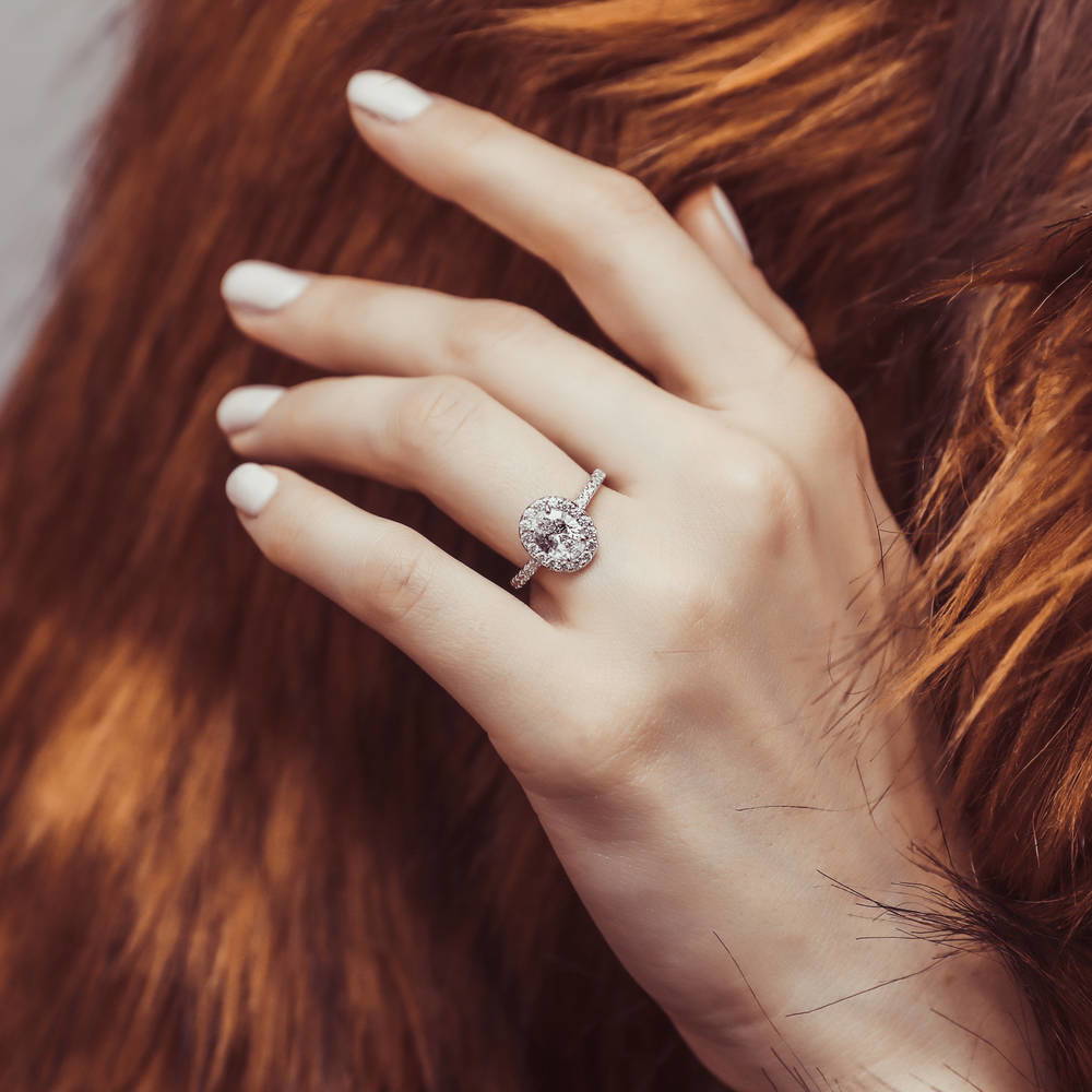 Model wearing Halo Oval CZ Ring in Sterling Silver, 3 of 8