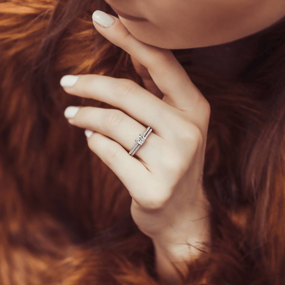 Model wearing Solitaire 0.6ct Cushion CZ Ring Set in Sterling Silver