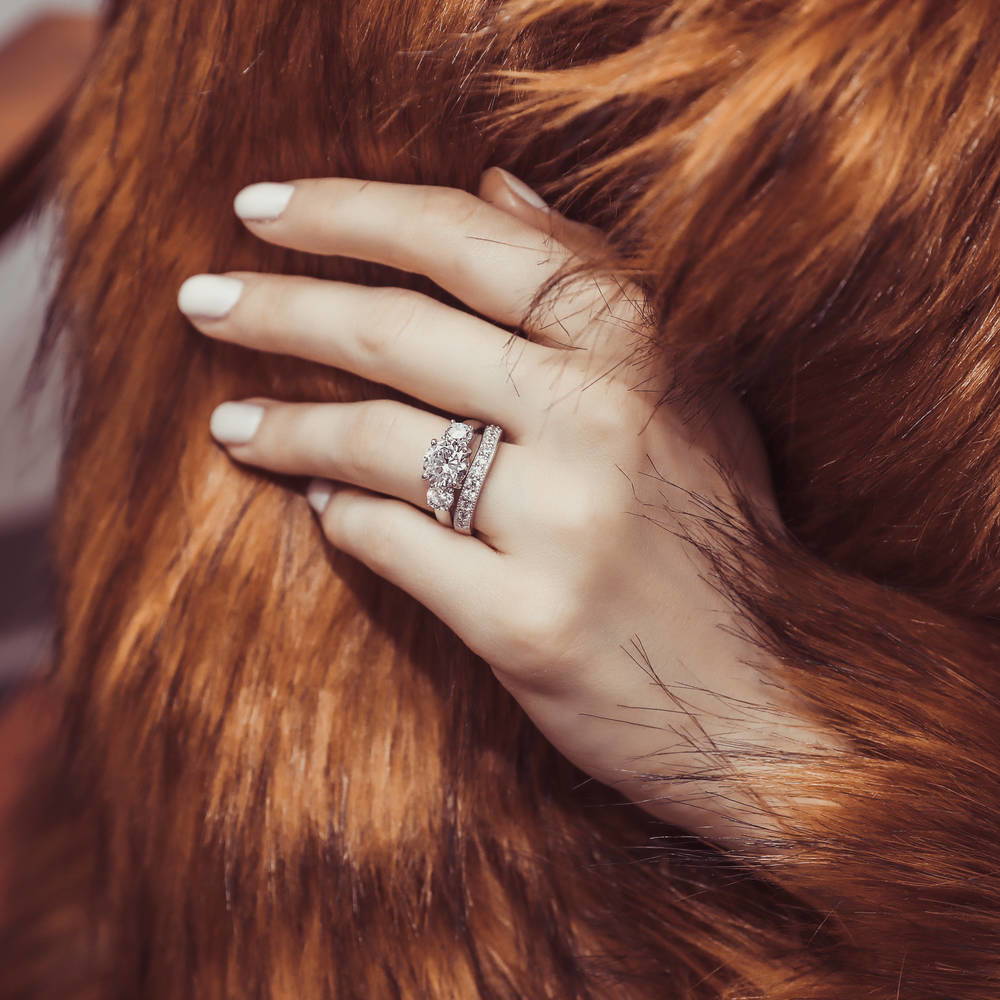 Model wearing 3-Stone Round CZ Ring Set in Sterling Silver