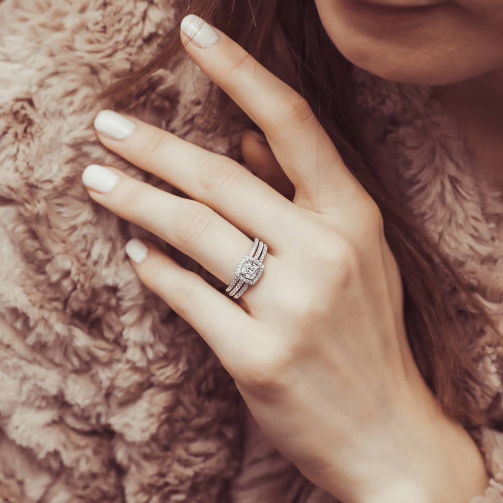 Model wearing Halo Cushion CZ Ring Set in Sterling Silver