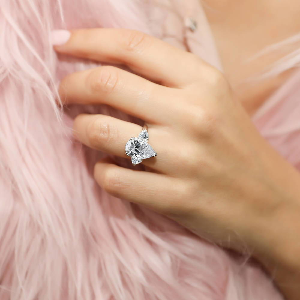 Model wearing 3-Stone Pear CZ Statement Ring in Sterling Silver