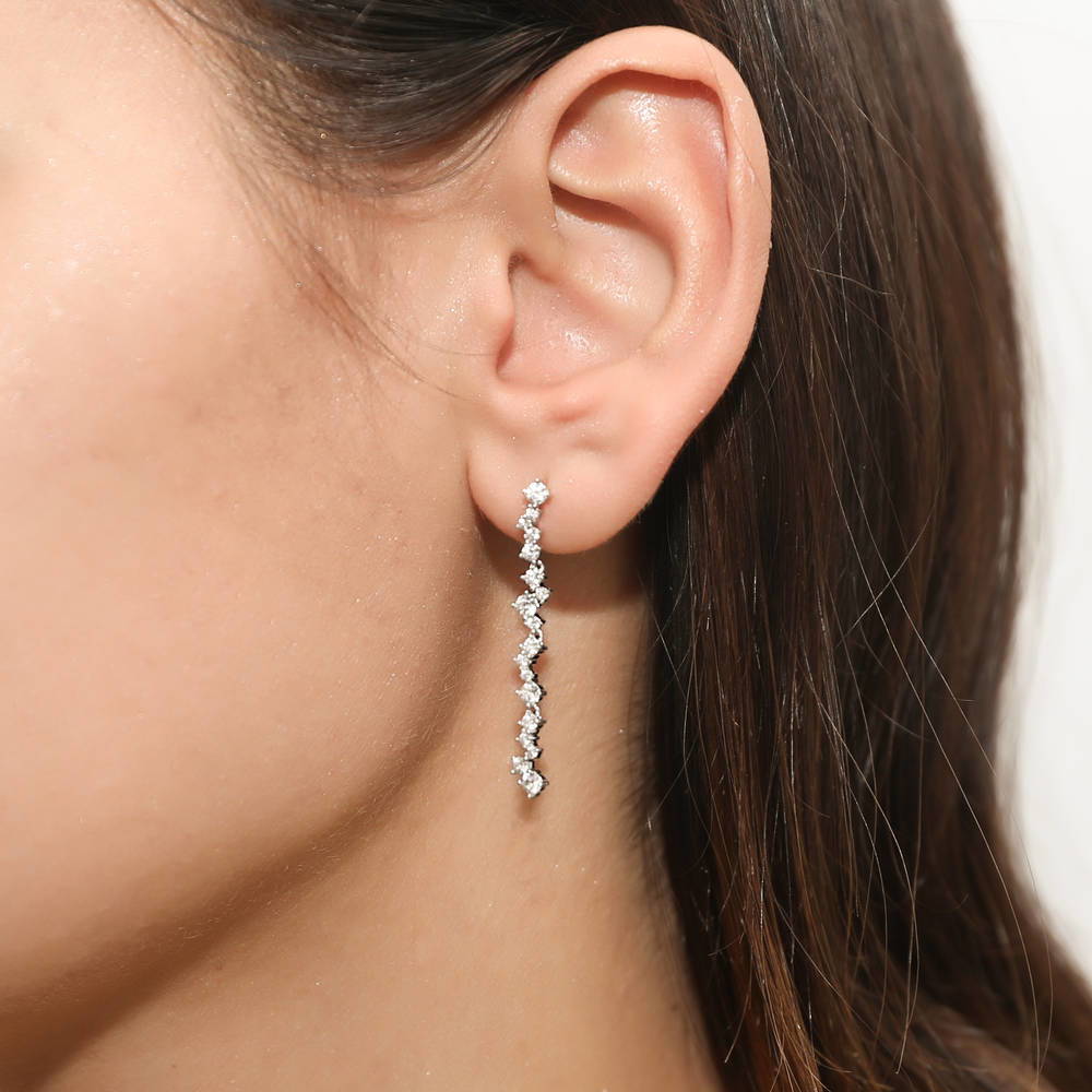 Model wearing Cluster Bar CZ Dangle Earrings in Sterling Silver