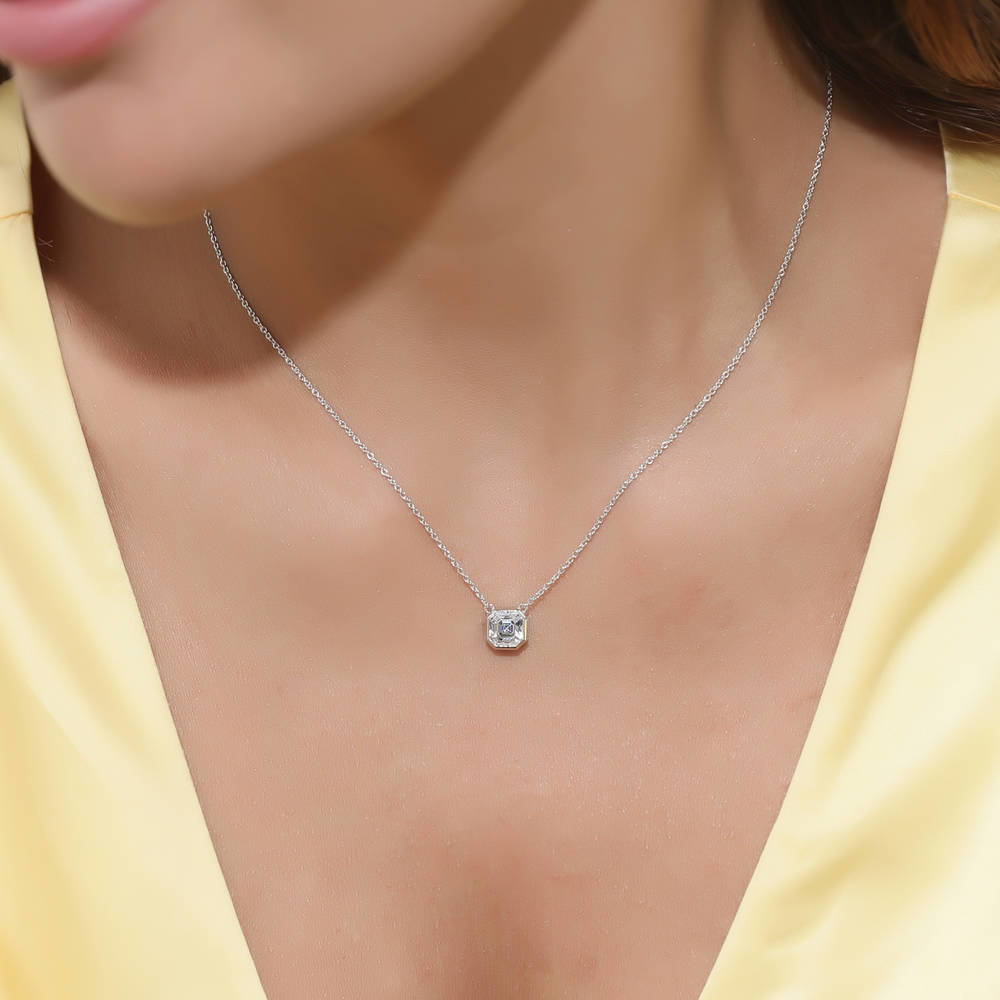 Model wearing Solitaire 1.2ct Bezel Set Asscher CZ Necklace in Sterling Silver, 2 of 5