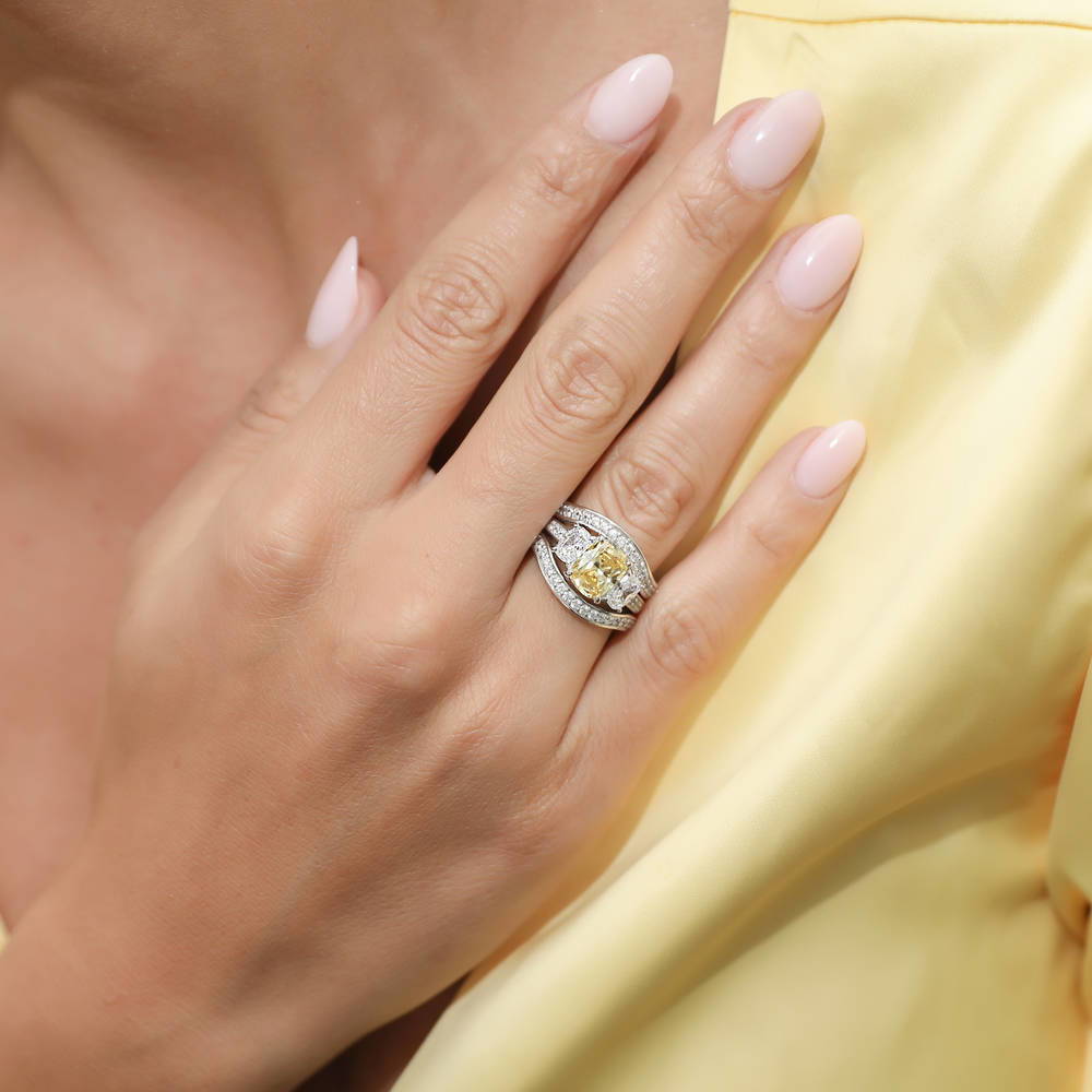 Model wearing 3-Stone Canary Yellow Cushion CZ Ring Set in Sterling Silver