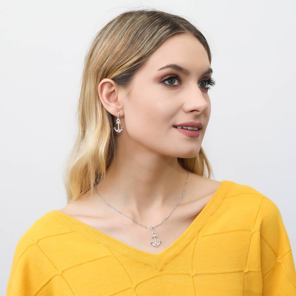 Model wearing Anchor CZ Dangle Earrings in Sterling Silver