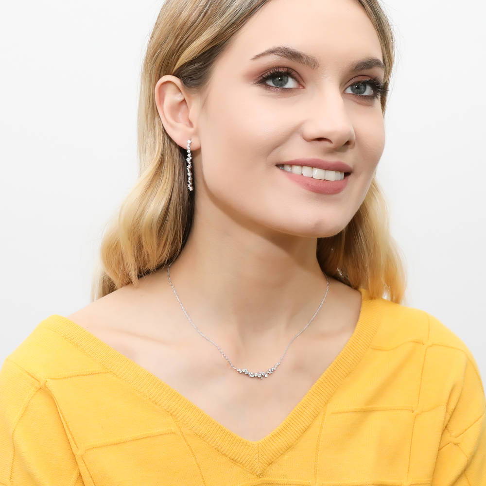 Model wearing Cluster Bar CZ Dangle Earrings in Sterling Silver