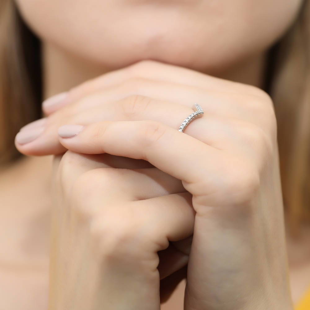 Model wearing Wishbone CZ Curved Eternity Ring in Sterling Silver