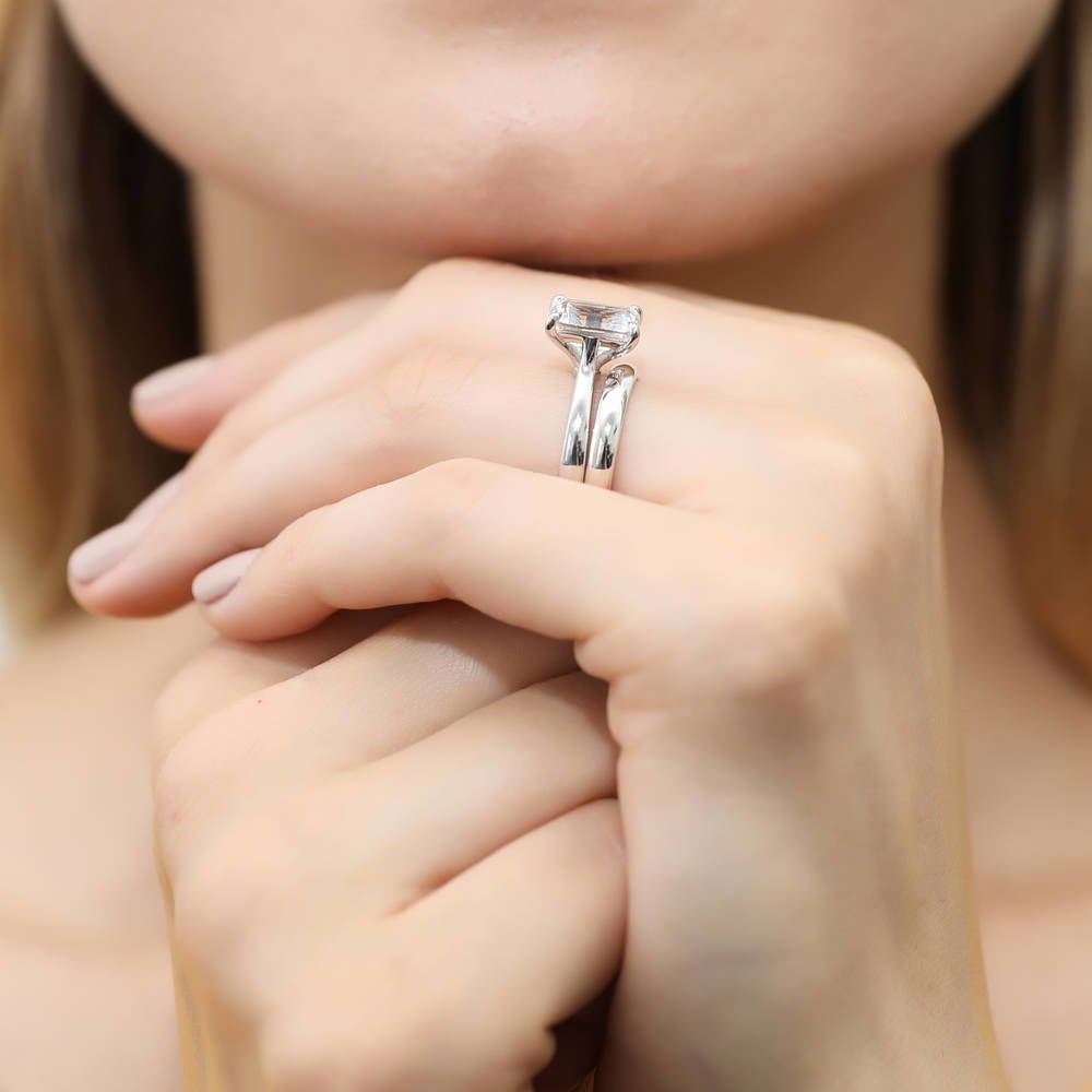 Model wearing Solitaire 2.6ct Emerald Cut CZ Ring Set in Sterling Silver, 6 of 12