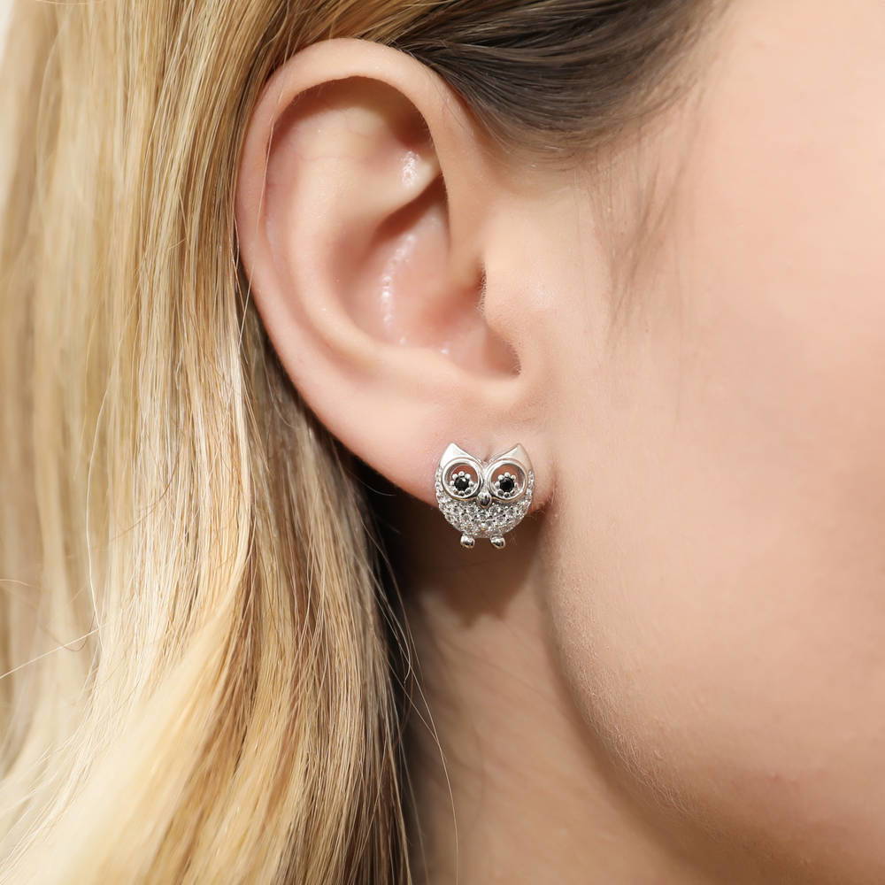 Model wearing Owl CZ Stud Earrings in Sterling Silver