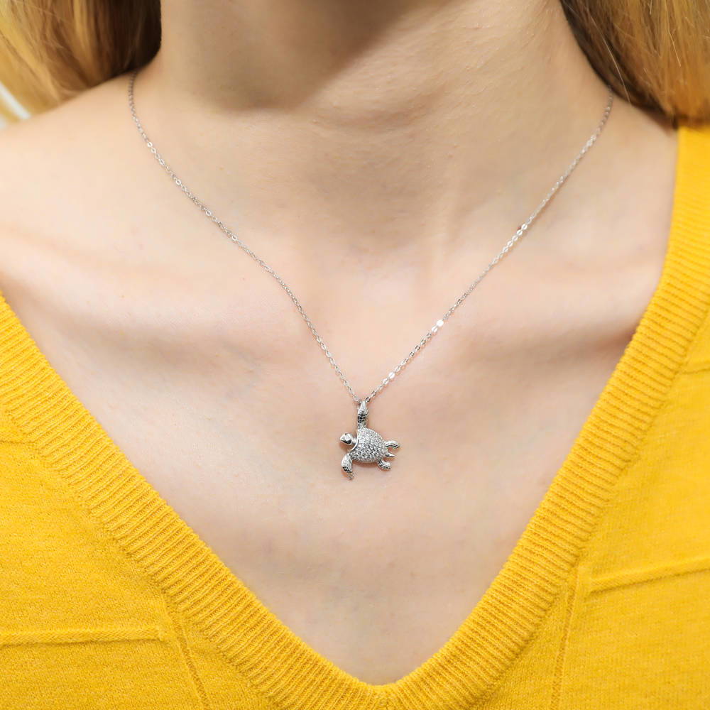 Model wearing Turtle CZ Pendant Necklace in Sterling Silver