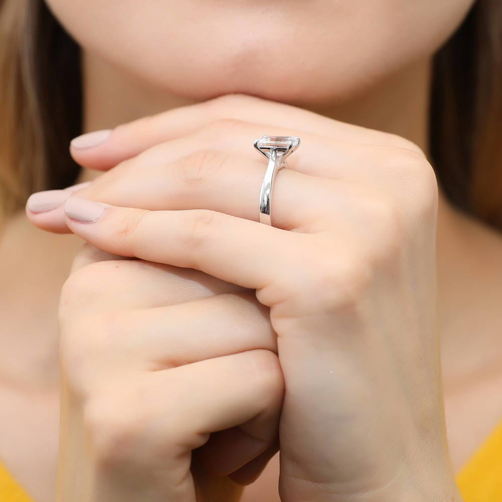 Model wearing Solitaire 2.6ct Emerald Cut CZ Ring in Sterling Silver, 3 of 8