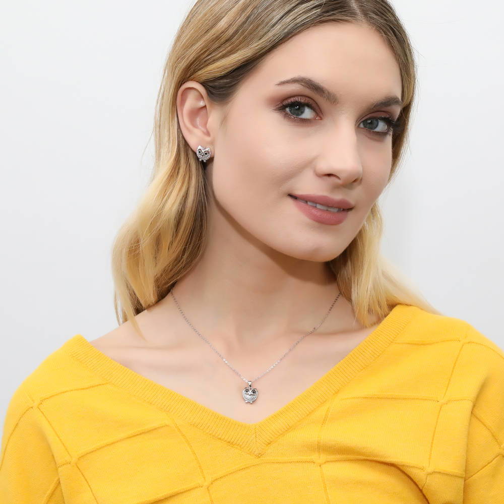 Model wearing Owl CZ Stud Earrings in Sterling Silver