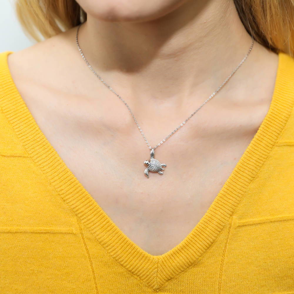 Model wearing Turtle CZ Pendant Necklace in Sterling Silver