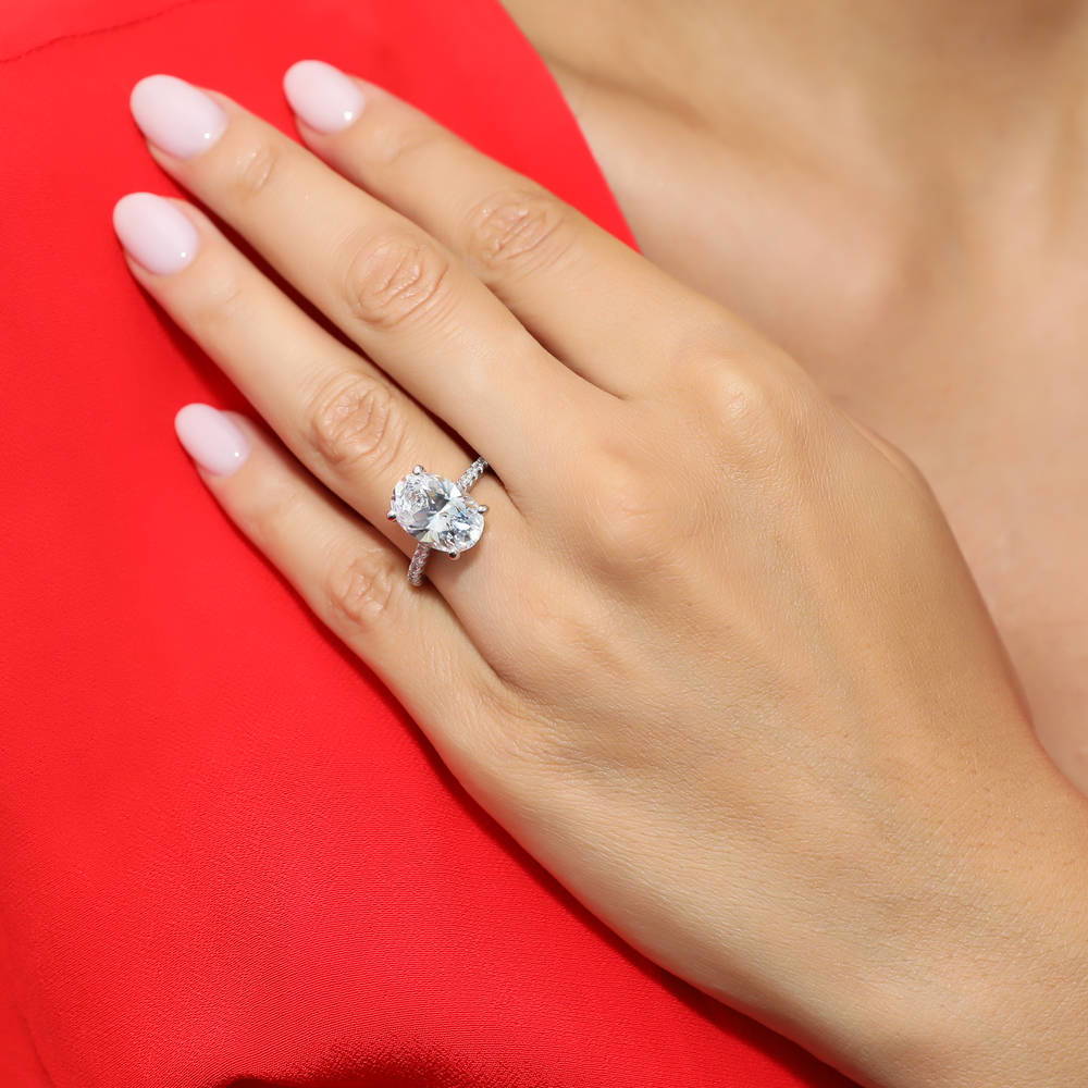 Model wearing Solitaire 5.5ct Oval CZ Statement Ring in Sterling Silver