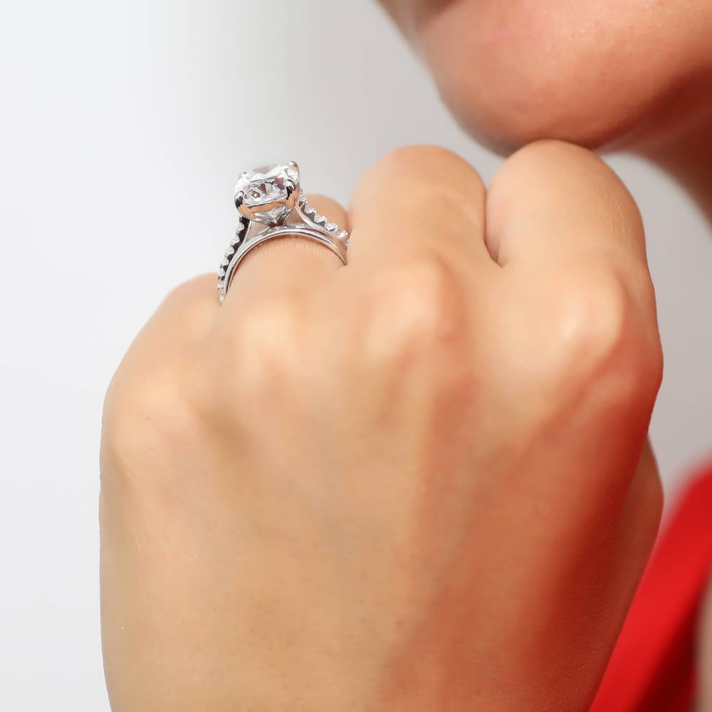Model wearing Solitaire 5.5ct Oval CZ Ring Set in Sterling Silver, 2 of 13