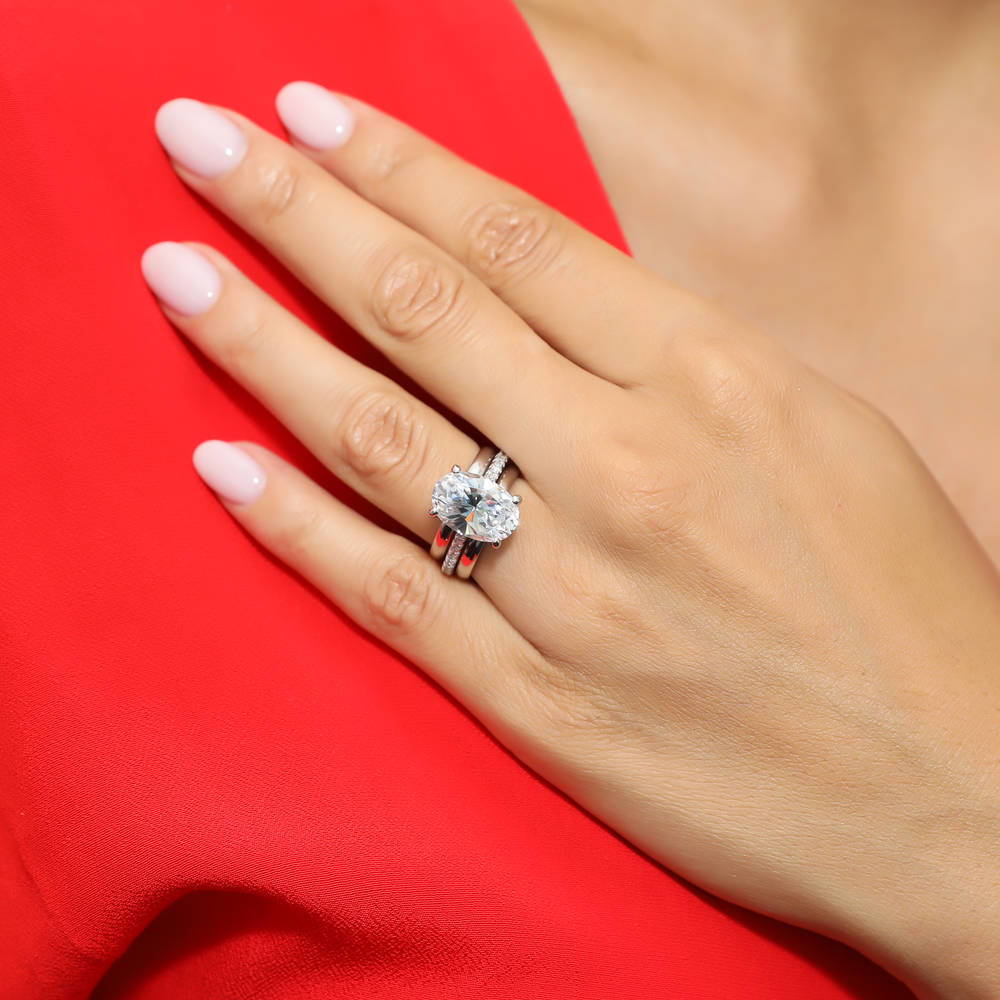 Model wearing Solitaire 5.5ct Oval CZ Ring Set in Sterling Silver, 5 of 12