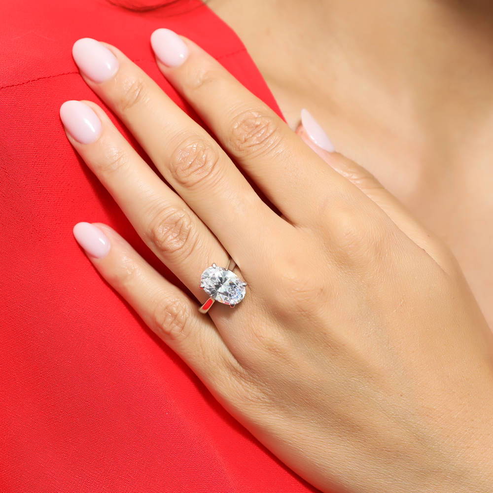 Model wearing Solitaire 5.5ct Oval CZ Statement Ring in Sterling Silver