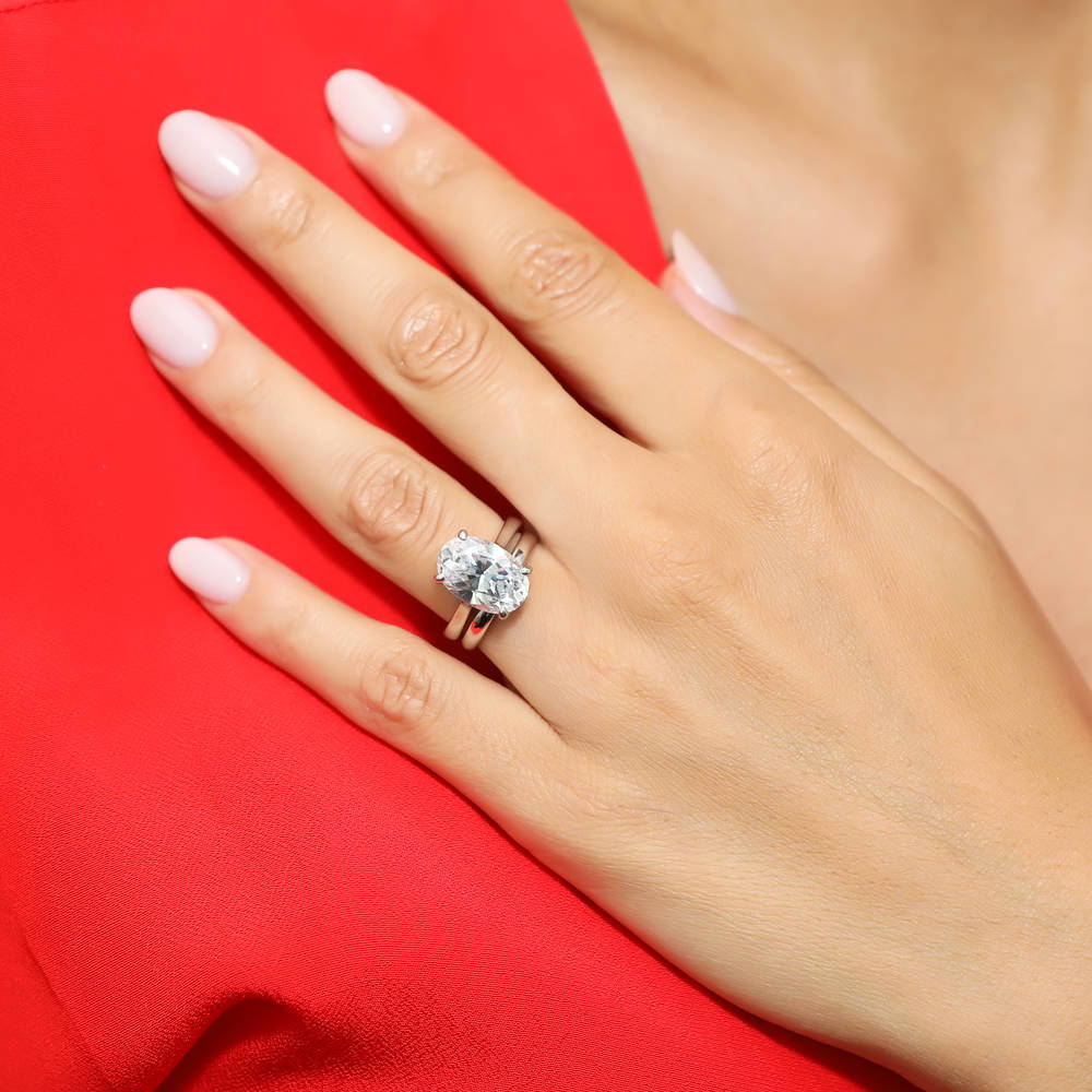 Model wearing Solitaire 5.5ct Oval CZ Ring Set in Sterling Silver, 6 of 12