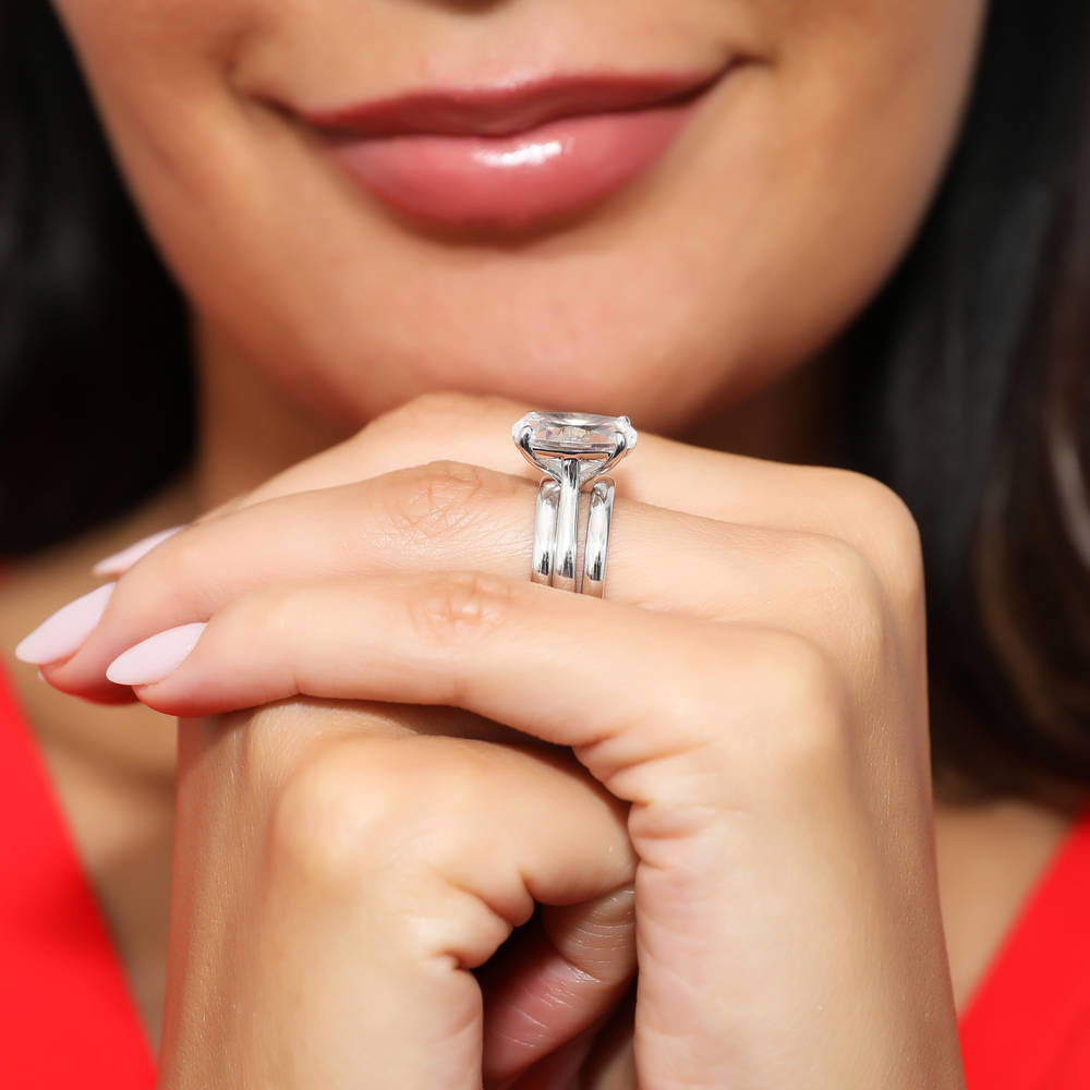 Model wearing Solitaire 5.5ct Oval CZ Ring Set in Sterling Silver