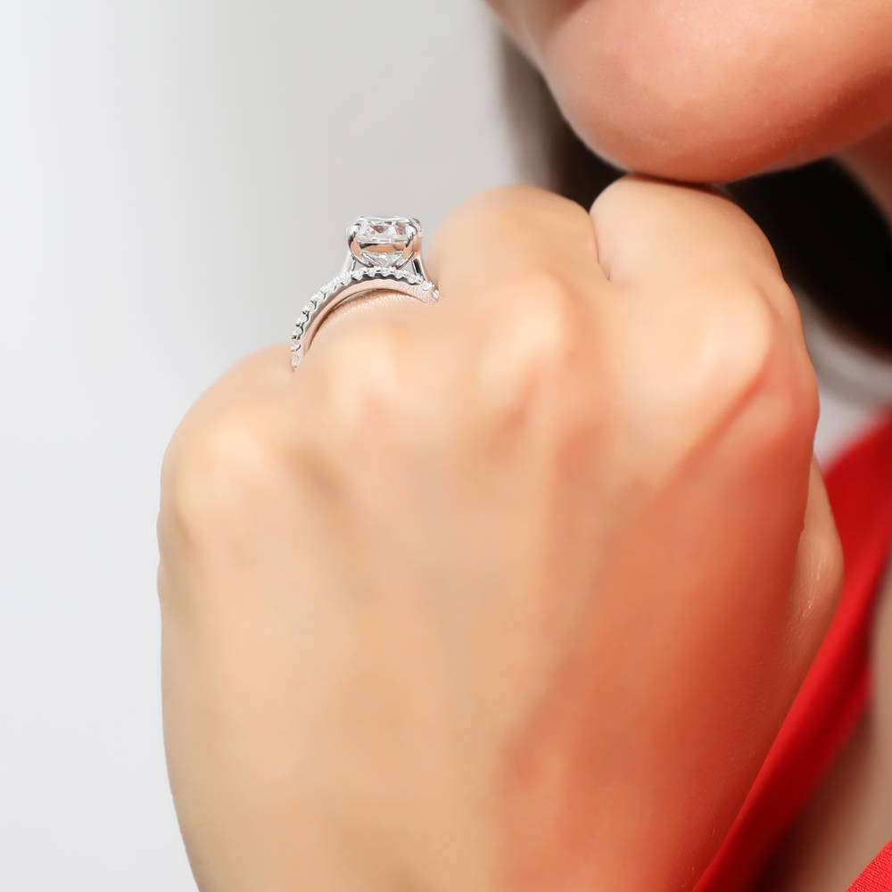 Model wearing Solitaire 5.5ct Oval CZ Ring Set in Sterling Silver