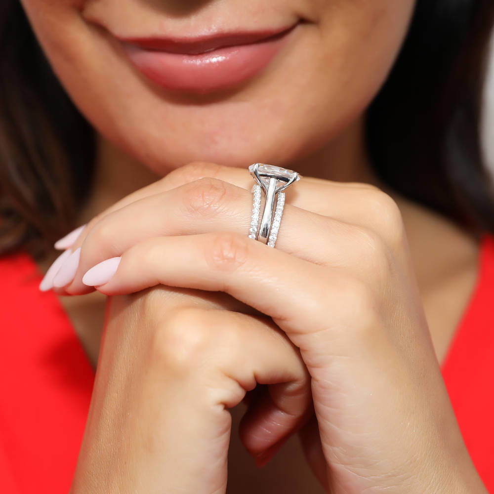 Model wearing Solitaire 5.5ct Oval CZ Ring Set in Sterling Silver