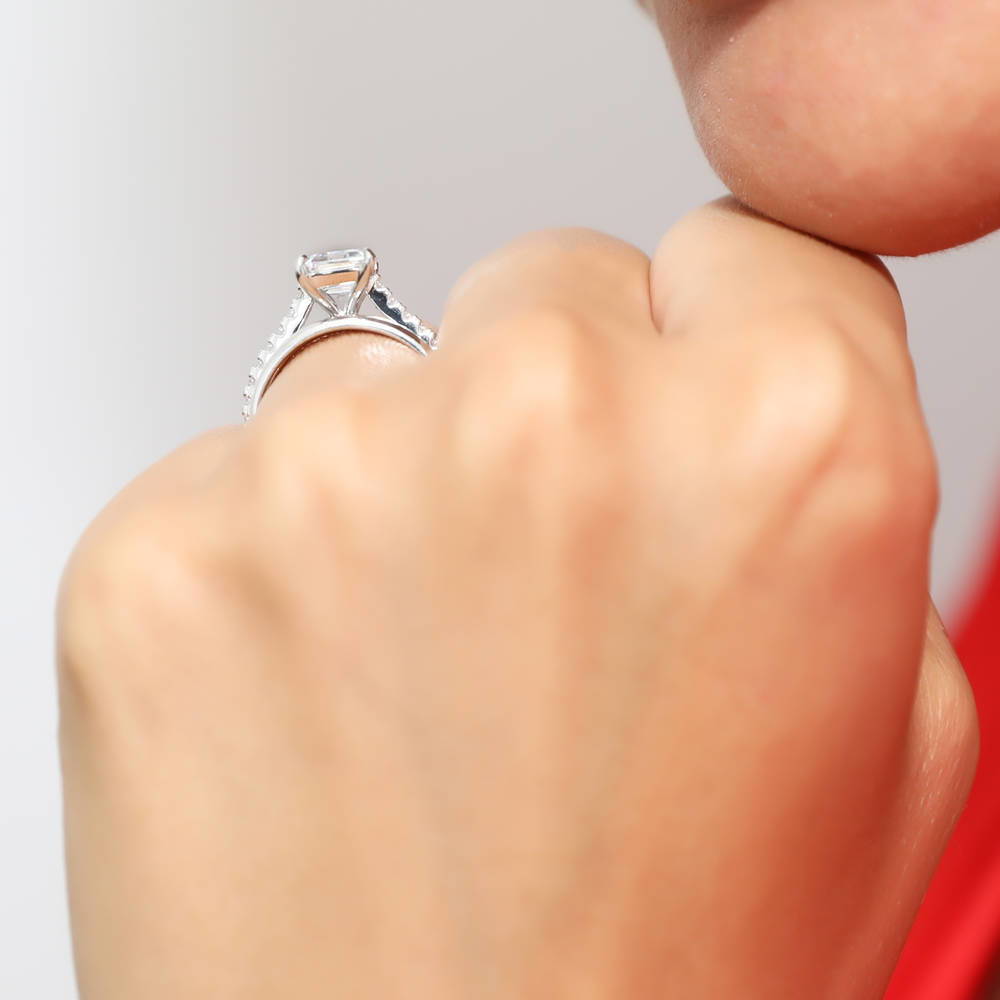 Model wearing Solitaire 2.6ct Emerald Cut CZ Ring Set in Sterling Silver, 2 of 12
