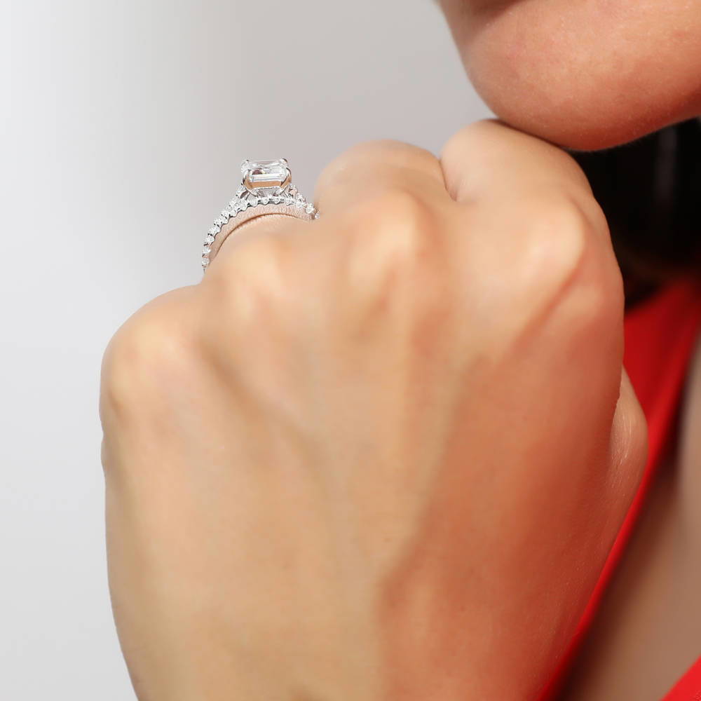 Model wearing Solitaire 2.6ct Emerald Cut CZ Ring Set in Sterling Silver