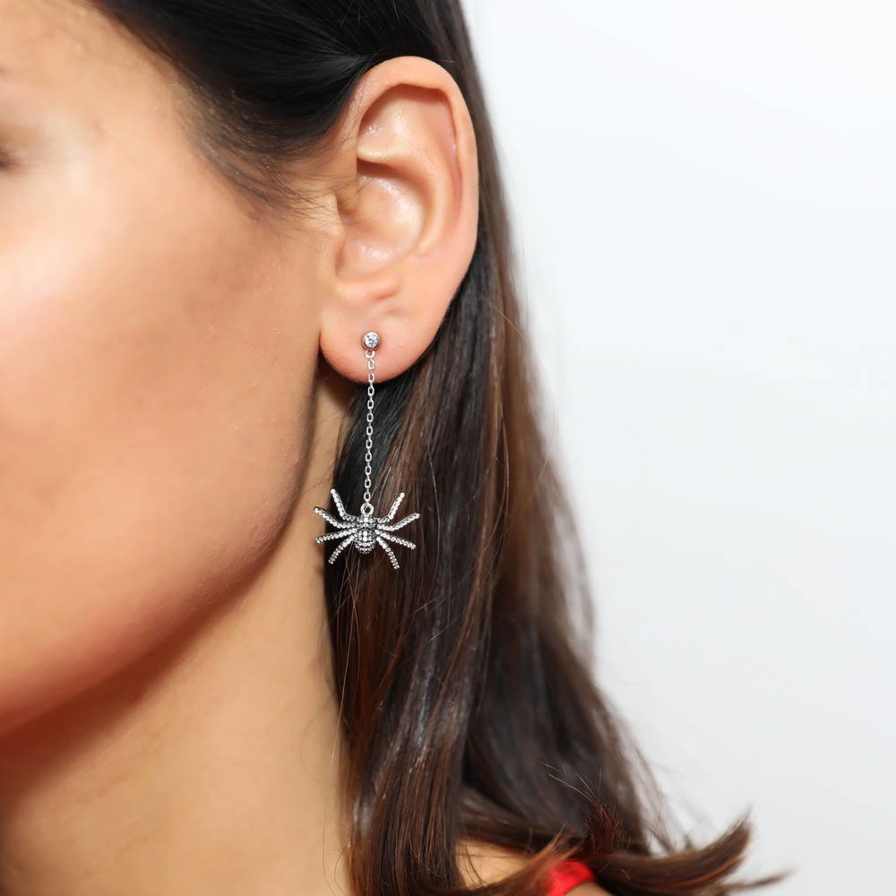 Model wearing Spider CZ Dangle Earrings in Sterling Silver