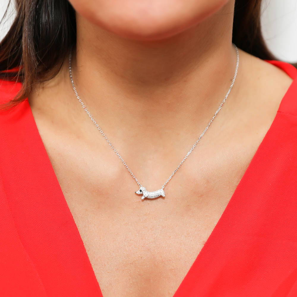 Model wearing Puppy CZ Pendant Necklace in Sterling Silver