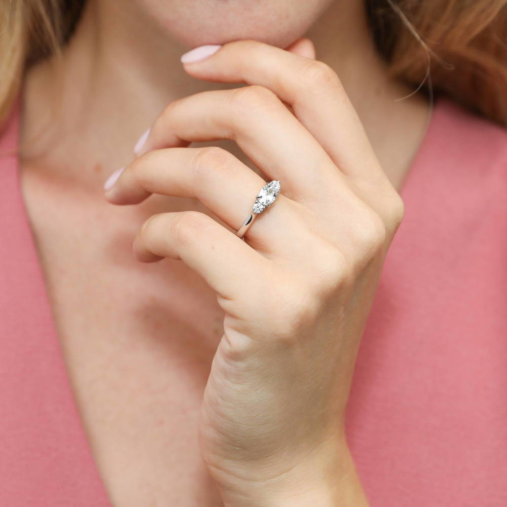 Model wearing 3-Stone East-West Oval CZ Ring in Sterling Silver, 2 of 8