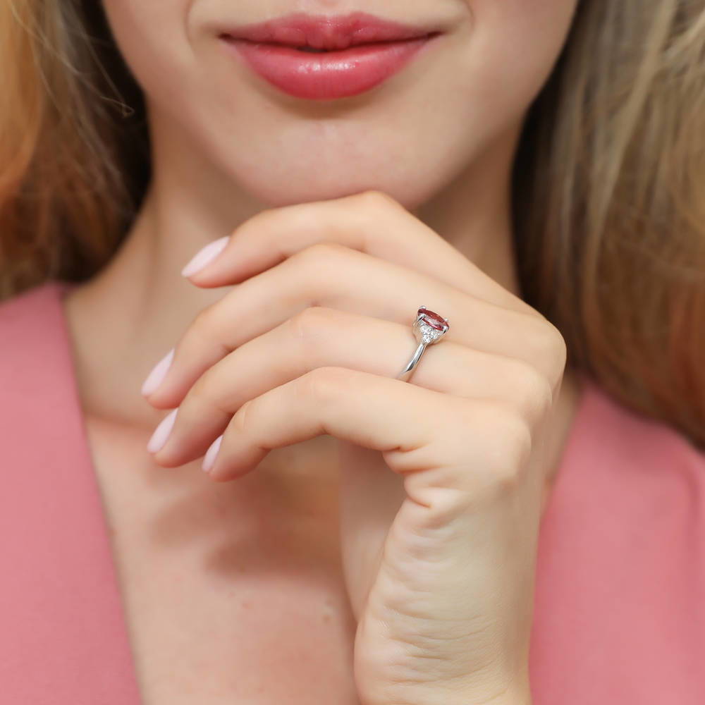 Model wearing Solitaire Red Oval CZ Ring in Sterling Silver 1.2ct