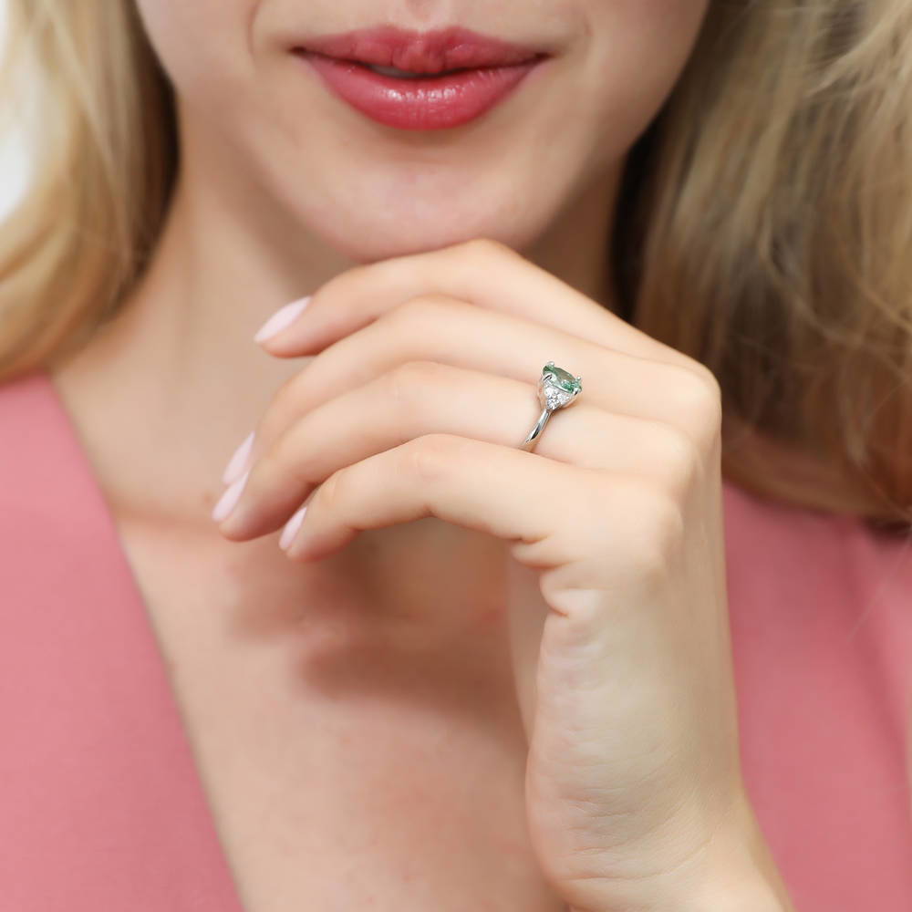 Model wearing Solitaire Green Oval CZ Ring in Sterling Silver 1.2ct