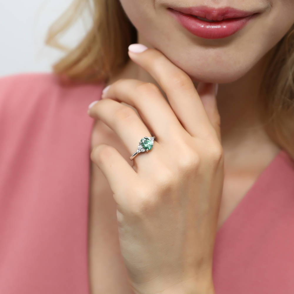 Model wearing Solitaire Green Oval CZ Ring in Sterling Silver 1.2ct