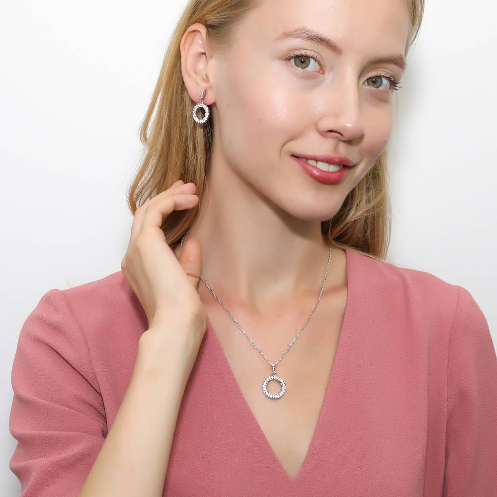 Model wearing Open Circle CZ Dangle Earrings in Sterling Silver