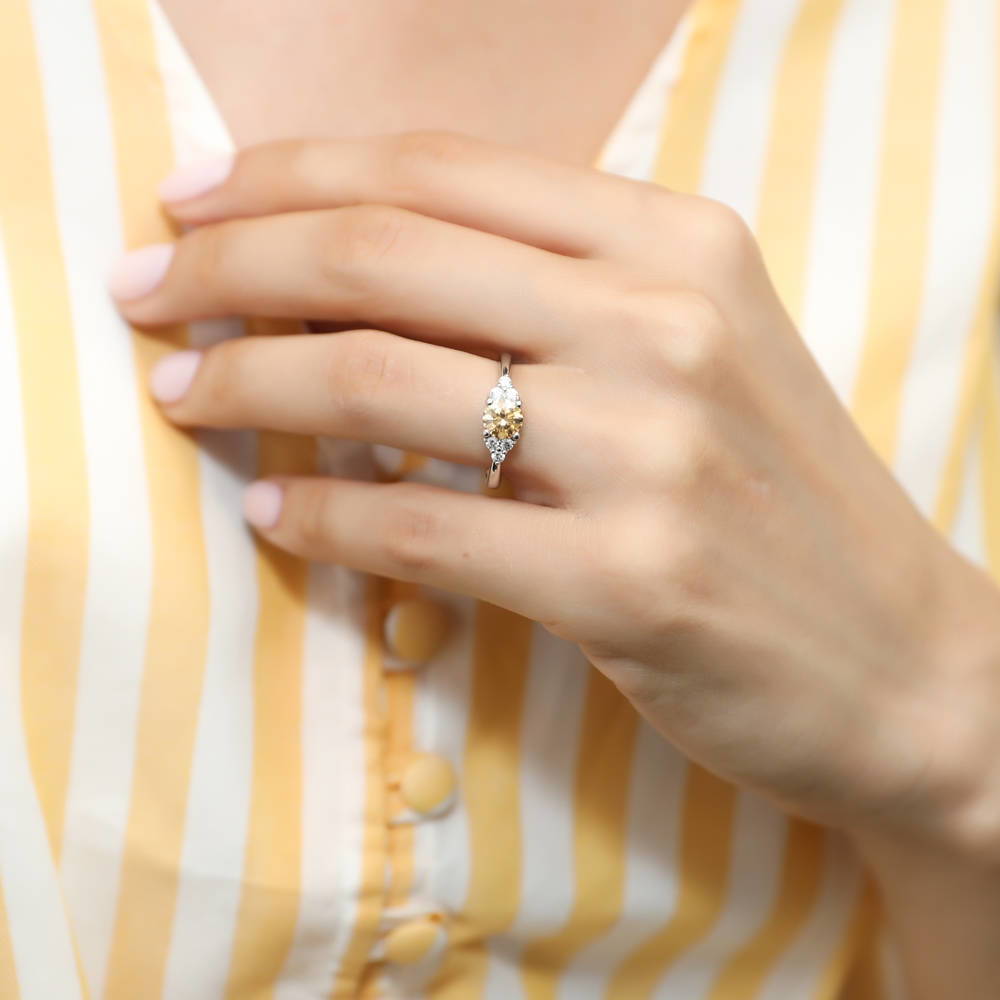 Model wearing Solitaire Yellow Round CZ Ring in Sterling Silver 0.8ct