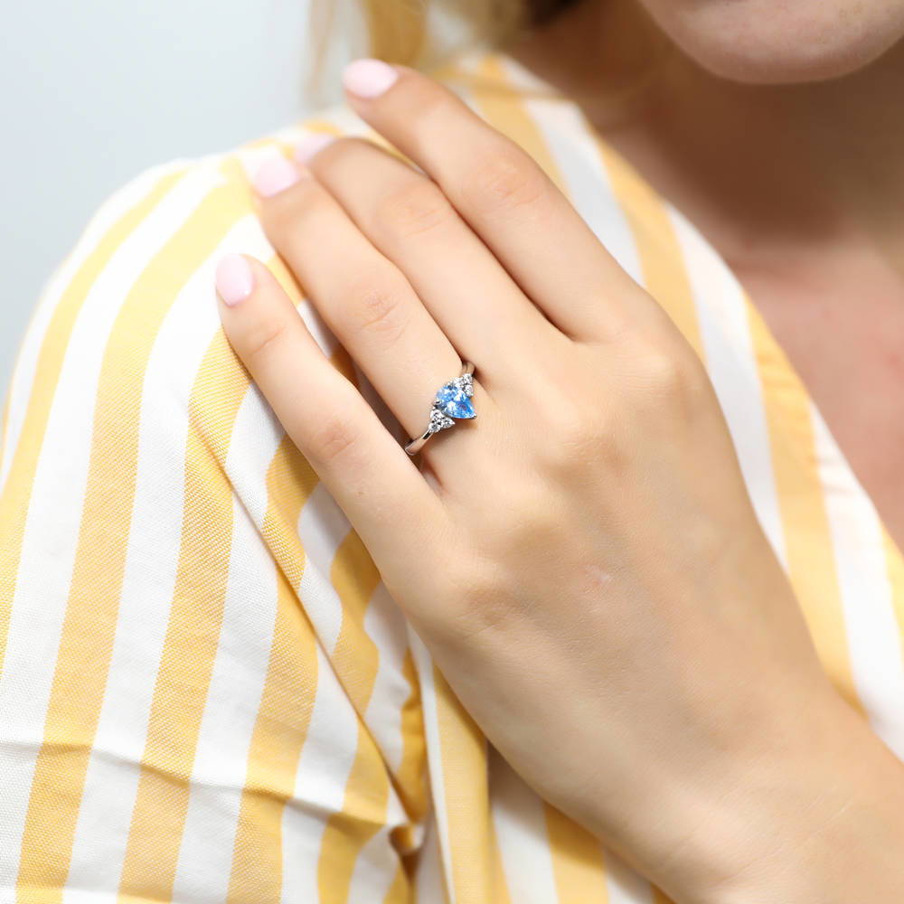 Model wearing Solitaire Blue Pear CZ Ring in Sterling Silver 0.8ct, 2 of 8