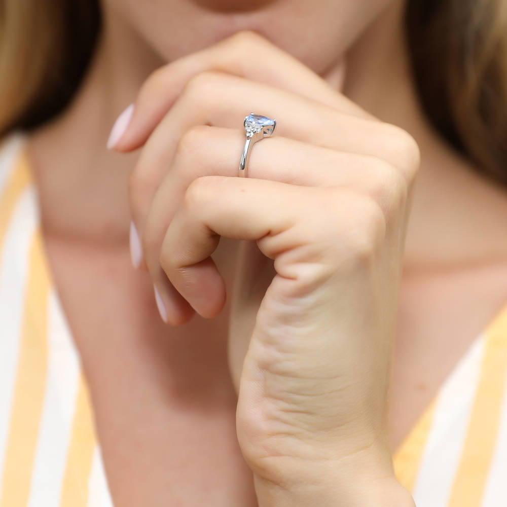 Model wearing Solitaire Blue Pear CZ Ring in Sterling Silver 0.8ct, 6 of 8